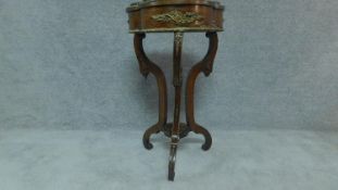 A 19th century oak and ormolu mounted jardiniere stand with metal liner. H.84cm