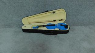 A violin in case. L:58cm