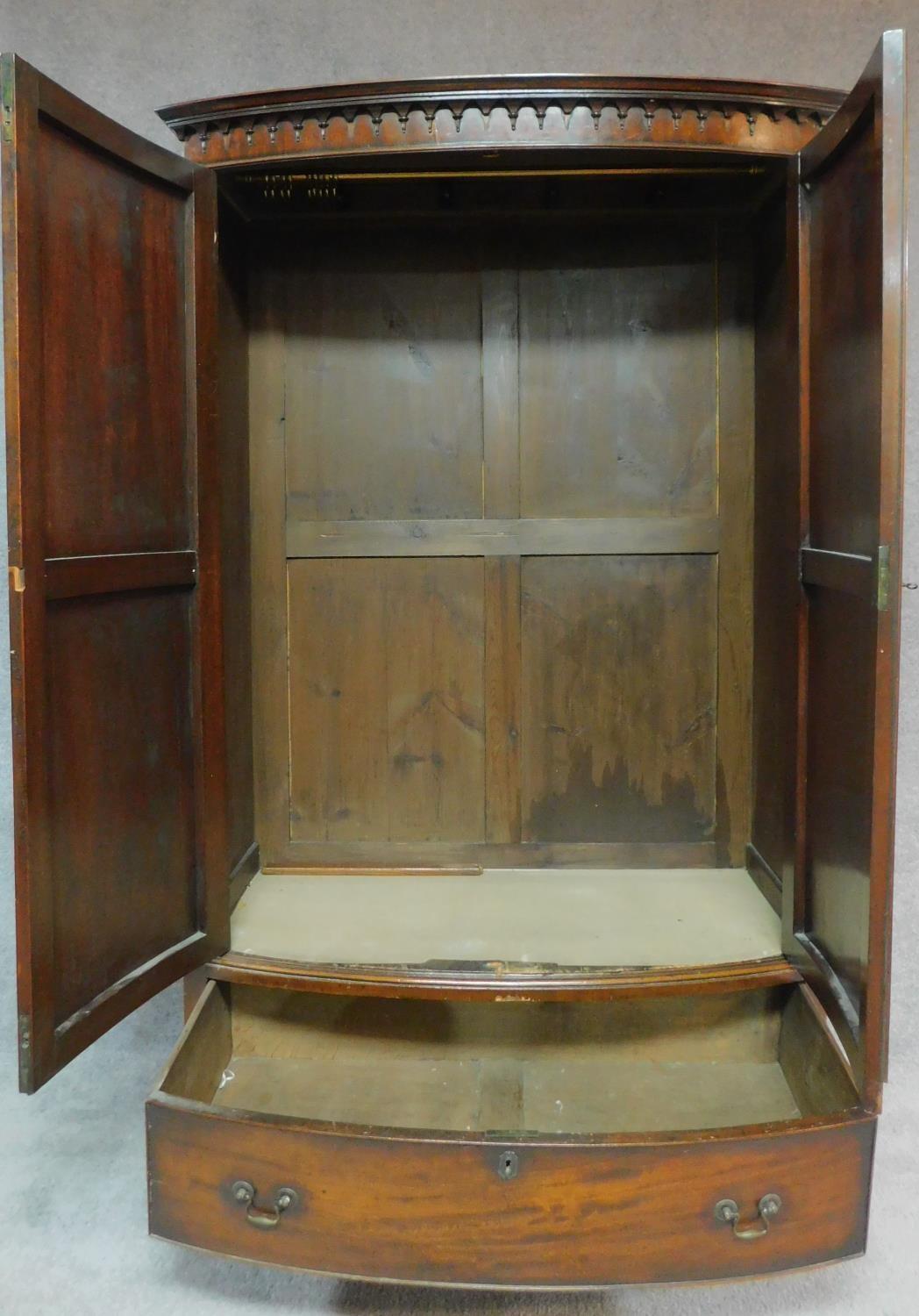 An early 20th century Georgian style mahogany bowfronted wardrobe fitted base drawer on swept - Image 2 of 10
