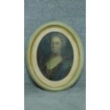 A 19th century oil on canvas laid on board, oval framed portrait. 59x48cm