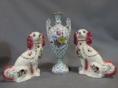 A pair of ceramic Staffordshire style dogs and a hand painted porcelain twin handled vase with