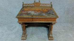 An unusual Victorian oak and mahogany Gothic style pedestal desk. H.74 W.93 D.68cm