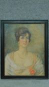 A framed oil on canvas, female portrait, signed Eleanor S Wood. 75x60cm