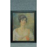 A framed oil on canvas, female portrait, signed Eleanor S Wood. 75x60cm