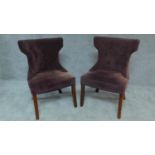 A pair of buttoned upholstered unicorn style tub side chairs. H.89cm