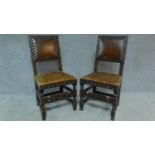 A pair of Carolean style oak framed leather studded and upholstered hall chairs. H.99cm