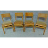A set of four vintage laminated school chairs. H.79cm
