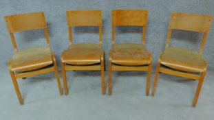 A set of four vintage laminated school chairs. H.79cm
