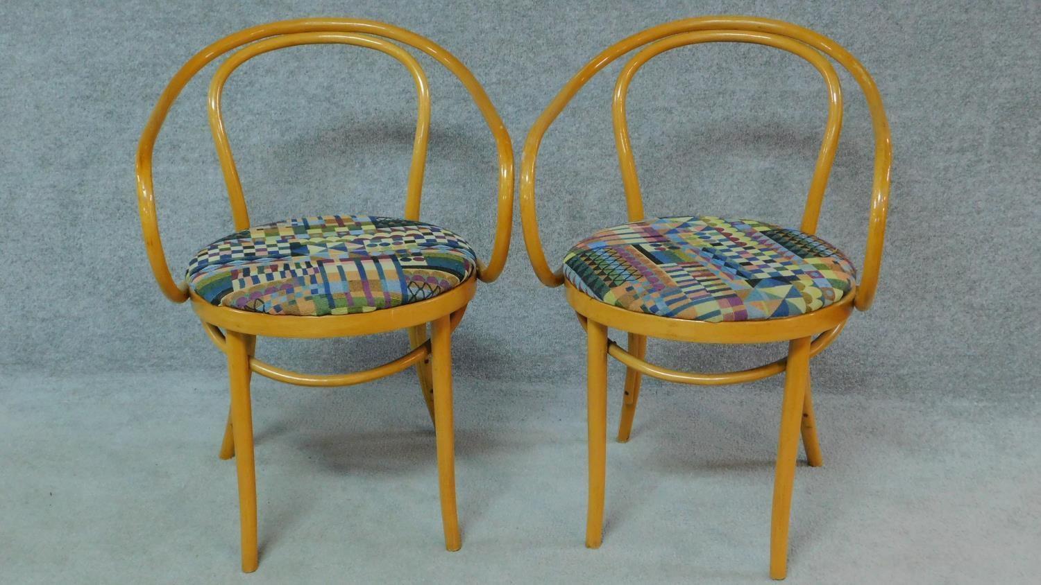 A pair of shaped bentwood armchairs stamped to underside. H.83cm
