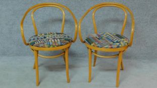 A pair of shaped bentwood armchairs stamped to underside. H.83cm