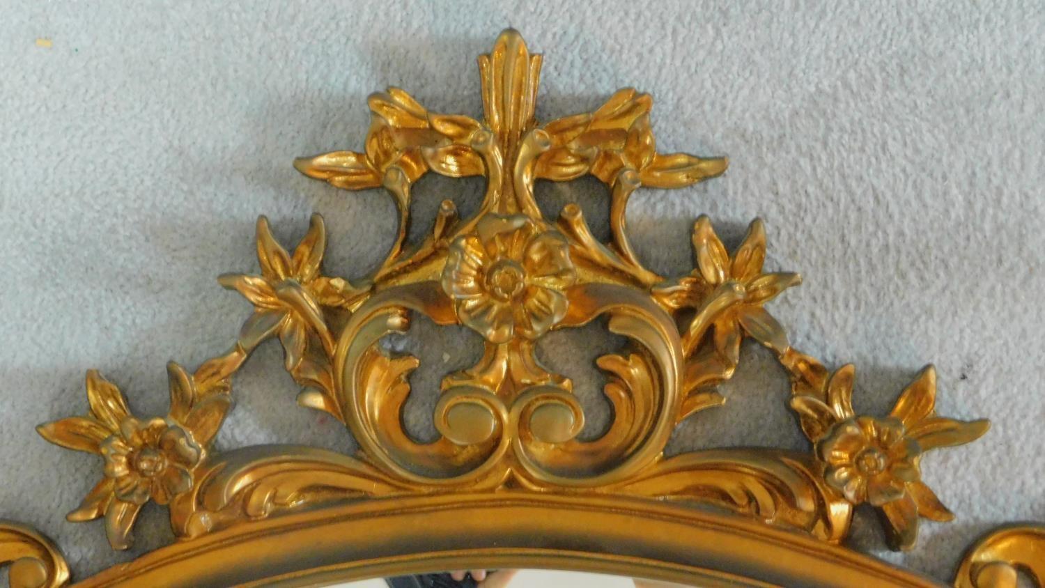 A arched gilt framed overmantel mirror with floral cresting. 116x122cm - Image 2 of 5
