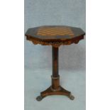 A Regency rosewood octagonal topped chessboard inlaid occasional table on tripod platform base and