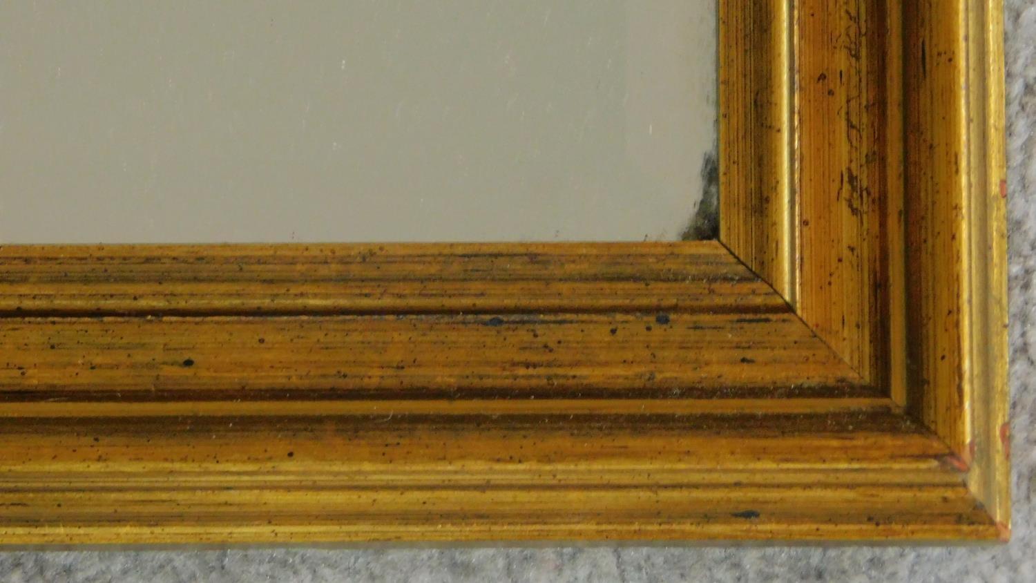 A rectangular gilt framed mirror with bevelled plate. 84x109 - Image 2 of 4
