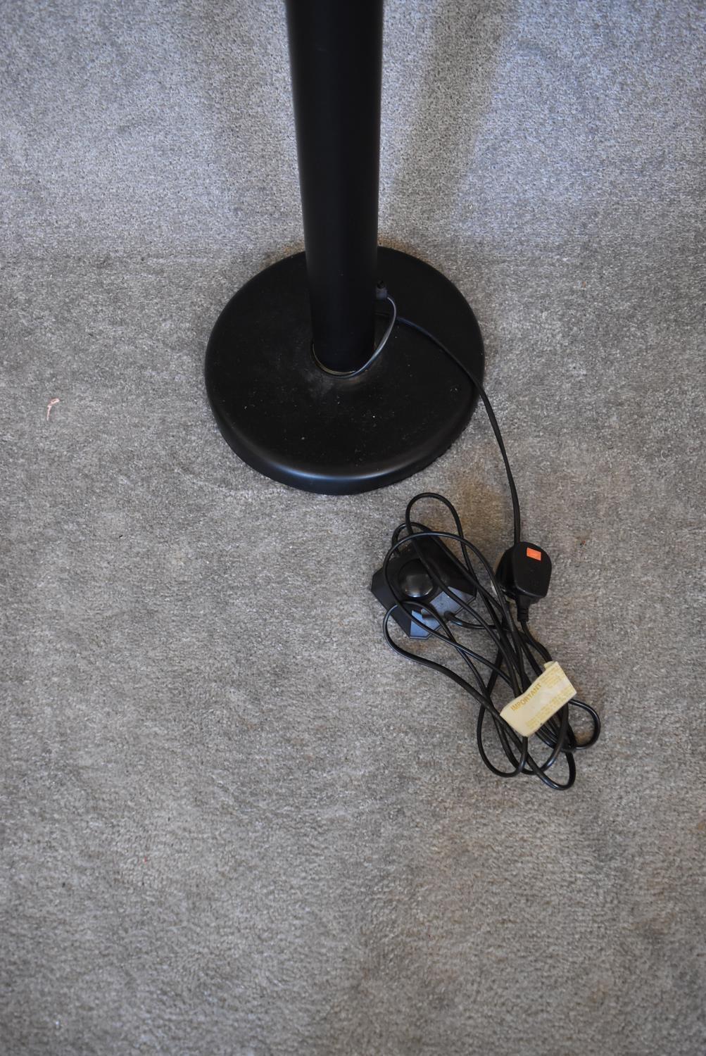 A floor standing lamp with black base and three branches each with brass light fittings, - Image 4 of 4