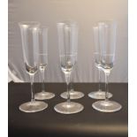 A set of six Reidel champagne flutes. H20cm