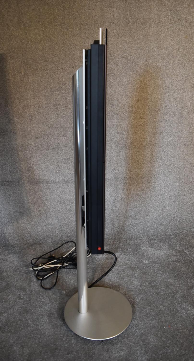 A Bang and Olufsen BeoSound 9000 vertical 6-CD player with floor stand. H 133 x 36cm - Image 2 of 6