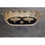 A gilt metal framed two seat tub shaped canape with fitted classical design squab cushion. H.75 x