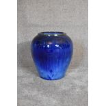 A blue drip glazed pot of bulbous form. H.40 x 35cm