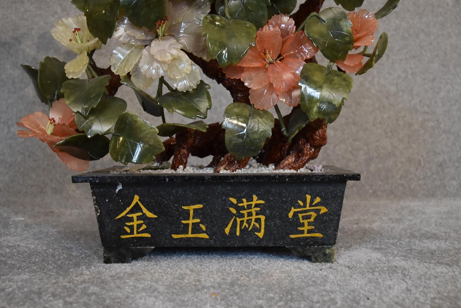 A Chinese carved jade and agate ornamental blossom tree with carved petals and leaves, in - Image 2 of 5