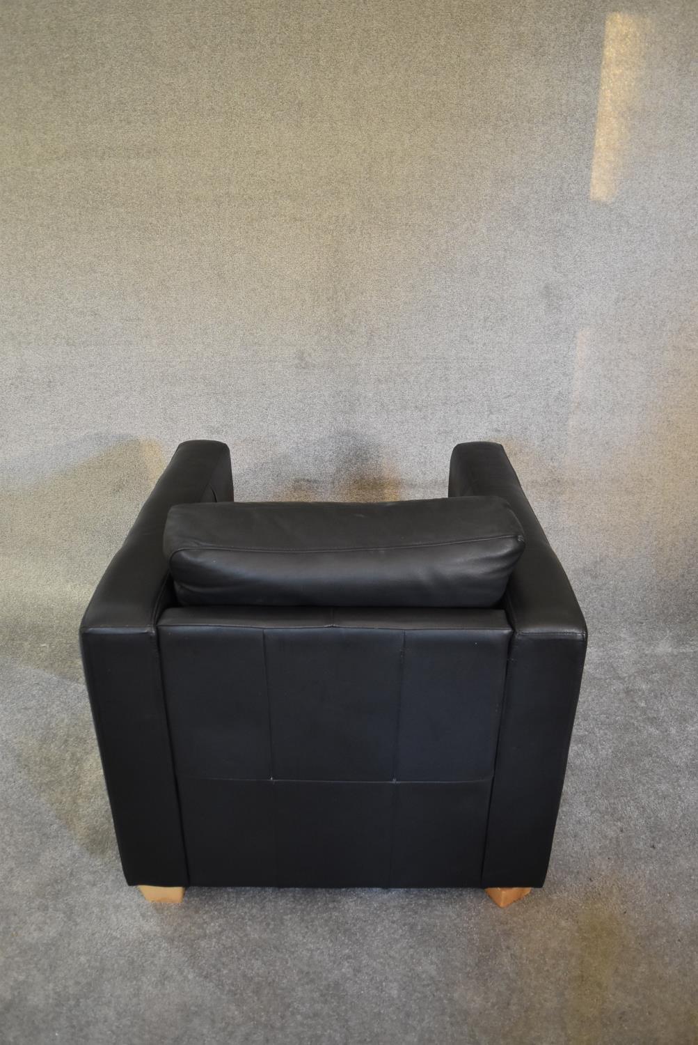 A black leather armchair with matching footstool. Chair: H. 67 x 80cm stool: H.44 x 70cm - Image 5 of 5