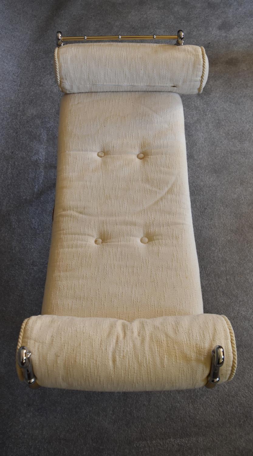 A gilt metal framed stool in cream coloured upholstery. H.60 x 110cm (one end bar missing) - Image 2 of 4