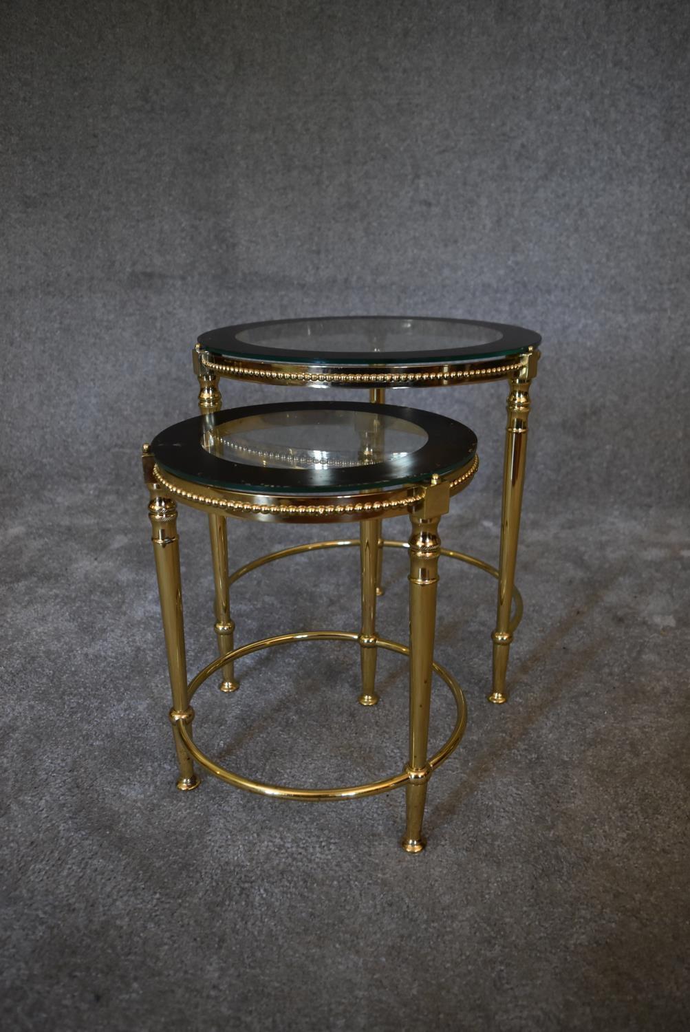 A nest of three brass circular graduating tables with clear glass tops and mirrored edges. Largest - Image 6 of 7
