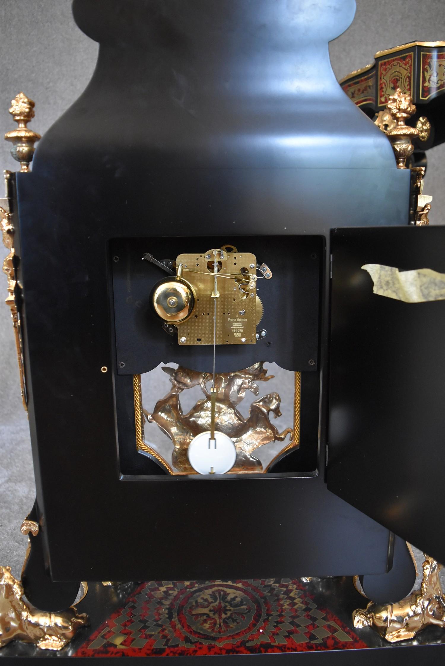 A decorative French style mantel clock in the Boulle manner with figural surmount on matching - Image 6 of 6