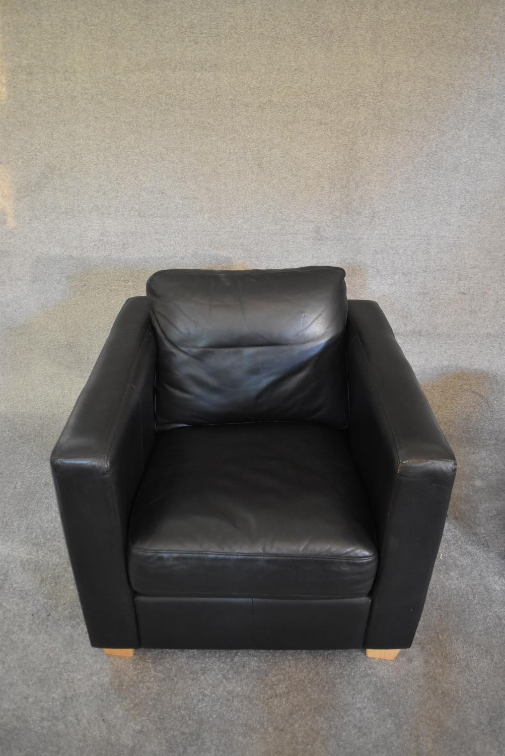 A black leather armchair with matching footstool. Chair: H. 67 x 80cm stool: H.44 x 70cm - Image 2 of 5