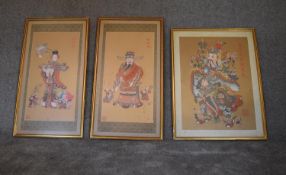 A set of three framed and glazed Chinese prints. H.86 x 47cm (largest).