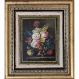 A gilt framed oil on, still life flowers. 39cm x 43cm.