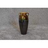 A Persian drip glazed vase with four handles. H.30cm