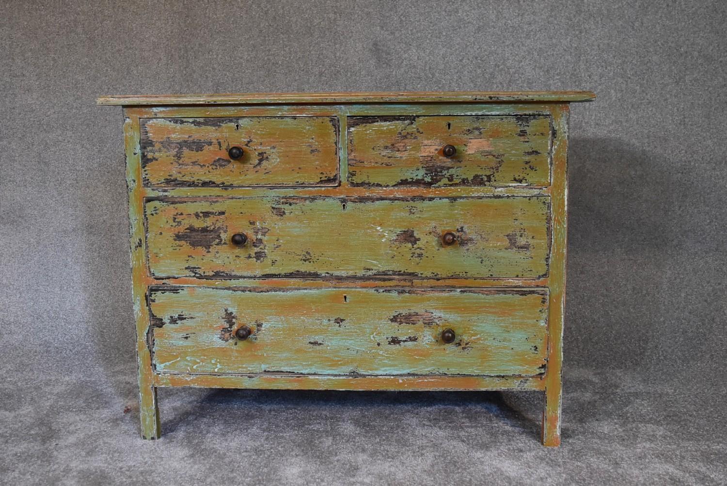 A mid 20th century mahogany chest of drawers in distressed painted finish. H.80 x 106cm