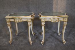 a pair of cream and gilt carved coffee tables with shaped bevelled inset glass tops. 60cm x 60cm.