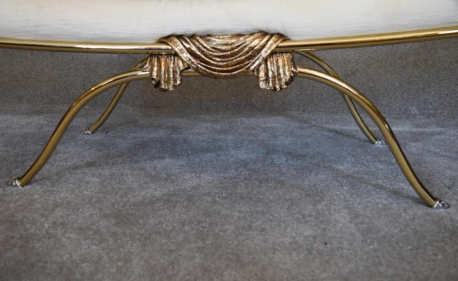 A gilt metal framed stool in cream coloured upholstery. H.60 x 110cm (one end bar missing) - Image 4 of 4