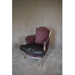 A distressed silver framed Louis XV style fauteuil in purple damask and contrasting faux crocodile