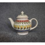 A 20th Century globular form teapot with floral design, by Emma Bridgwater. H22cm