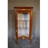 A Louis XV style kingwood vitrine with ormulu mounts on cabriole supports. H.162 x 68cm