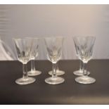 A set of six crystal sherry glasses. H.9cm