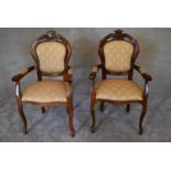 A pair of French style mahogany open armchairs on cabriole supports. H.102 x 60cm