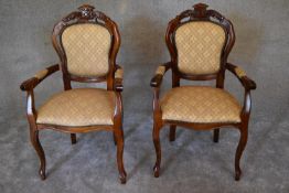 A pair of French style mahogany open armchairs on cabriole supports. H.102 x 60cm