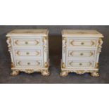 A pair of cream and gilt Rococo style bedside chests fitted three drawers on scrolling bracket feet.