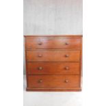 A 19th century mahogany chest fitted with linen drawer with pull out slides above three further