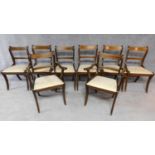 A set of eight mahogany and inlaid Regency style dining chairs. H.88cm