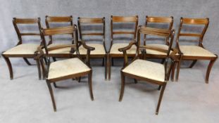 A set of eight mahogany and inlaid Regency style dining chairs. H.88cm