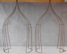 A pair of metal gothic form garden arches. H.227cm