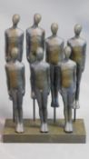 A moulded group figure study, standing men. H.44cm