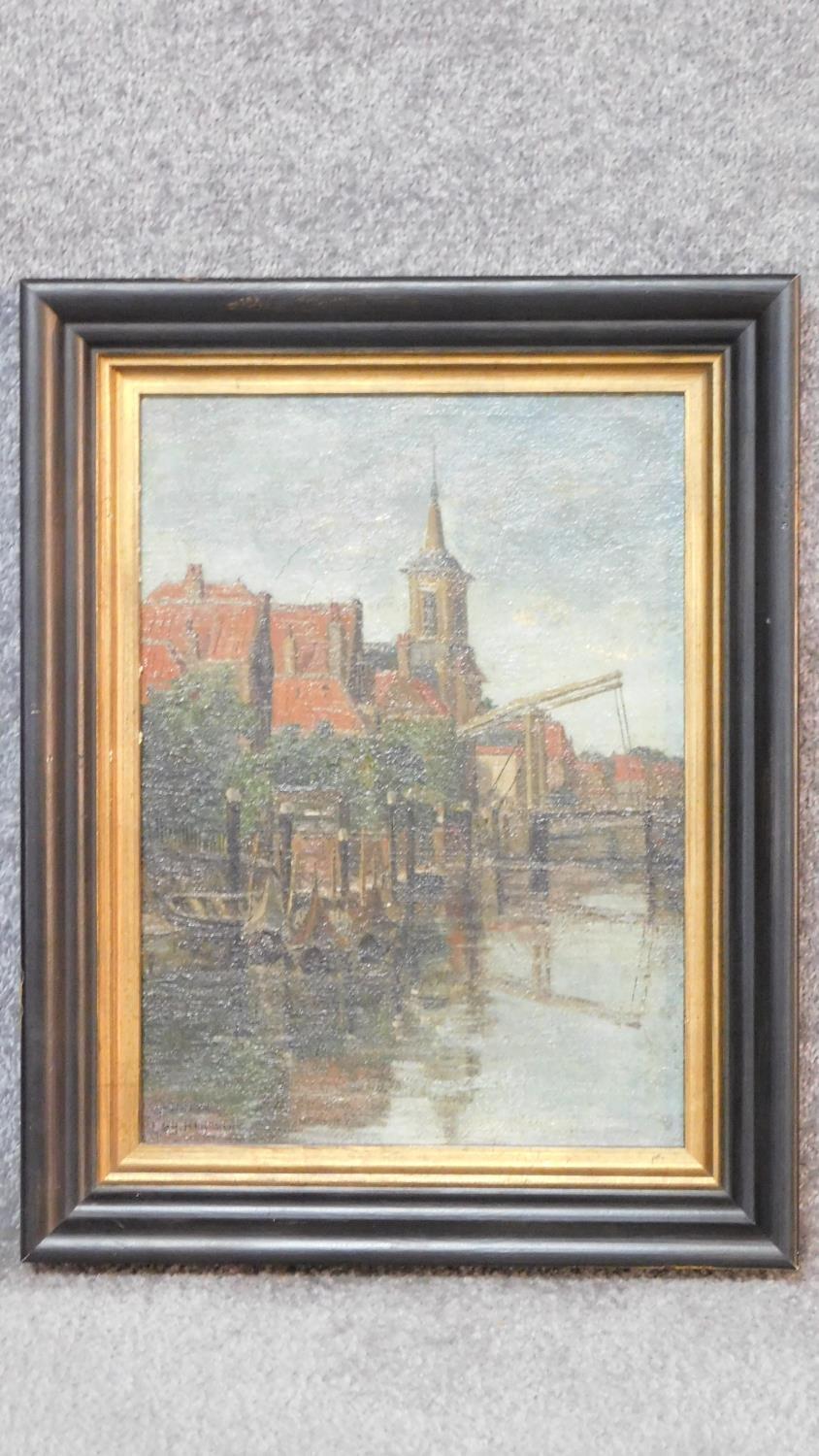 Eugene Rensburg (1872-1956) A framed oil on canvas, Dutch canal scene, signed. 49x39cm