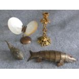 A collection of vintage brass items, including a brass butterfly with oyster shell wings, an