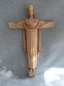 An Italian wooden carved religious statue. Makers mark to reverse. H 95cm.