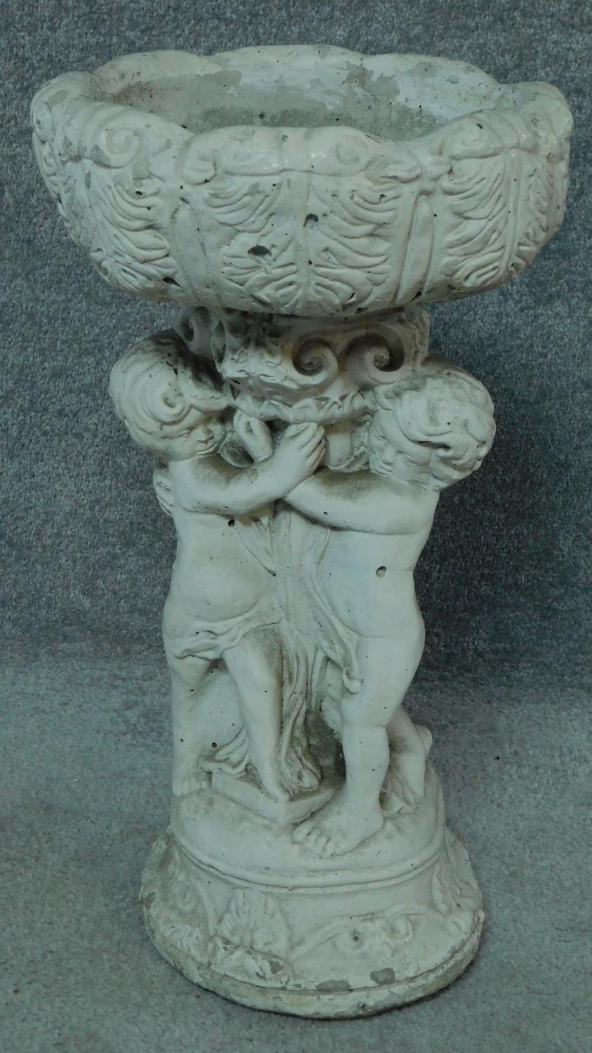 A painted concrete birdbath and seated buddah. Birdbath with three cherubs holding an urn. H.54 ( - Image 4 of 7